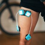 Compex Ultimate PRO niebieski, zdjęcie z użycia podczas treningu